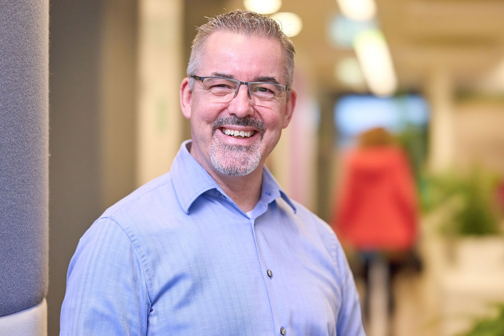 person standing with cell phone